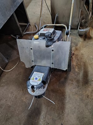 Lot 23 - DR Commercial Trimmer/Mover
